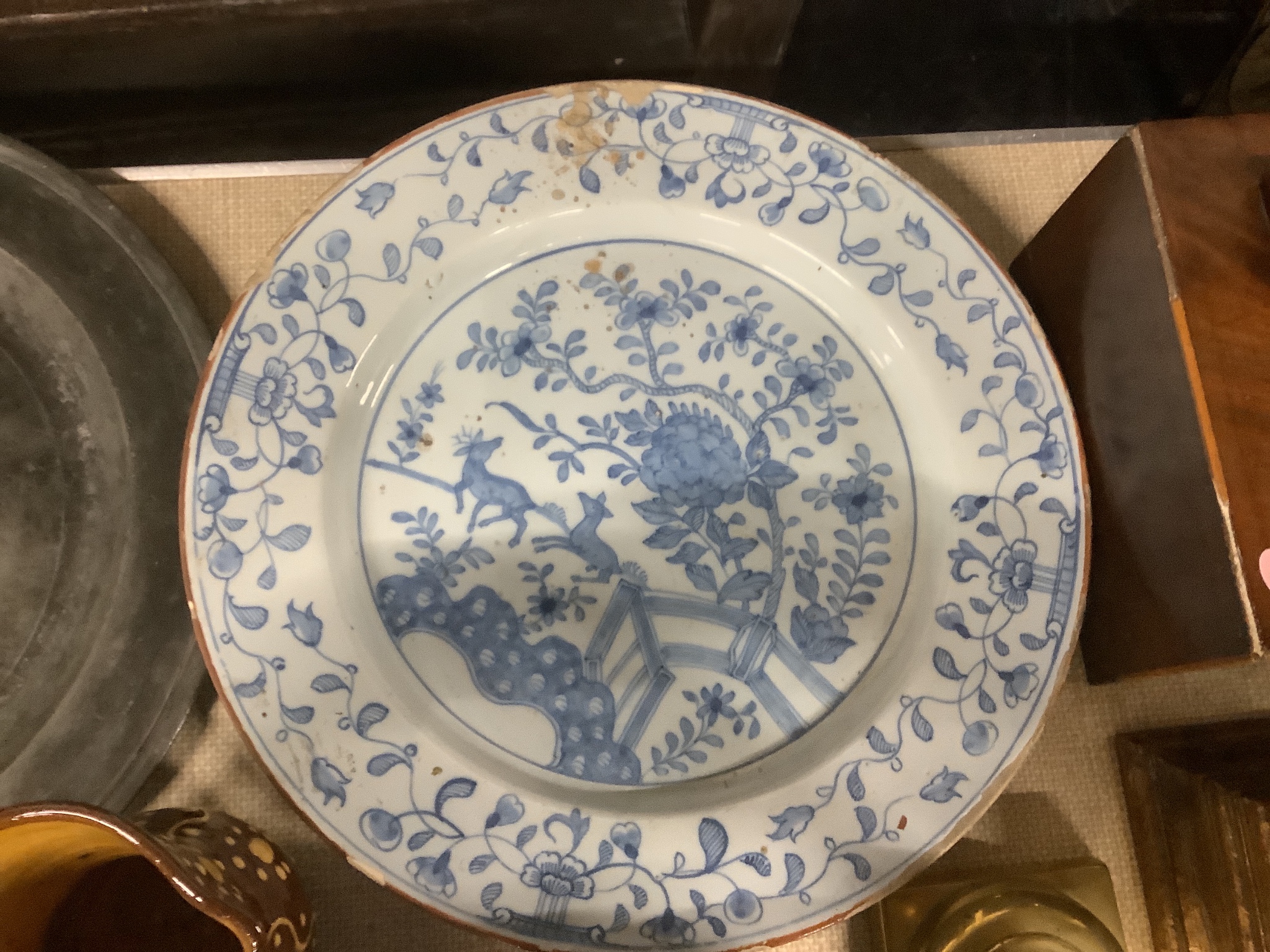 An 18th century Delft chinoiserie charger, 36cm diameter
